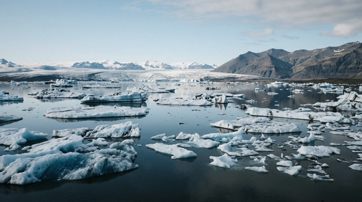 Icebergs drifting across Jokulsarlon glacier lagoon toward the glacier front, the view that answers is jokulsarlon worth it